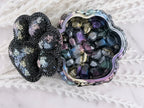 Rhinestone paw print lid resting open on the resin trinket box