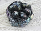 Interior detail of the faceted gems inside the trinket box