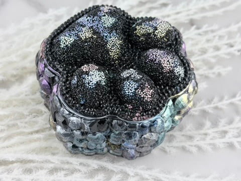 Interior detail of the faceted gems inside the trinket box