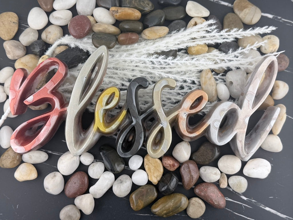 Detail of the shimmering resin finish on the letters