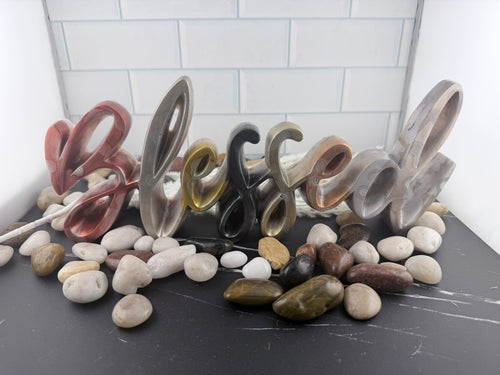 Angled close-up of the marbled resin letters