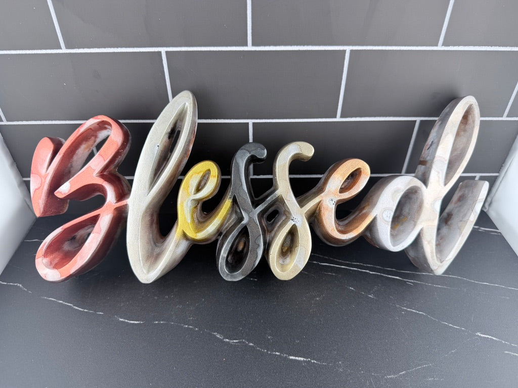 Blessed resin sign detail shot
